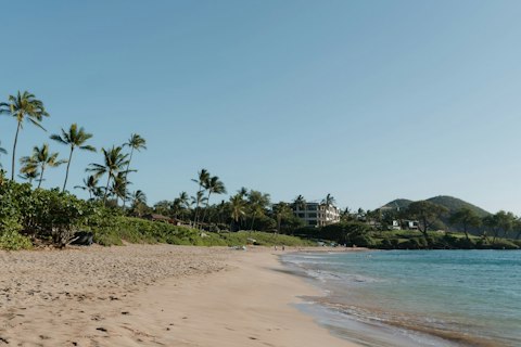 Snorkel Ulua Beach's reef and savour its sheltered swimming, a four-minute drive