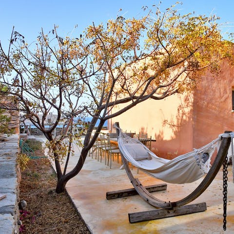 Nestle into a hammock with a good book in hand