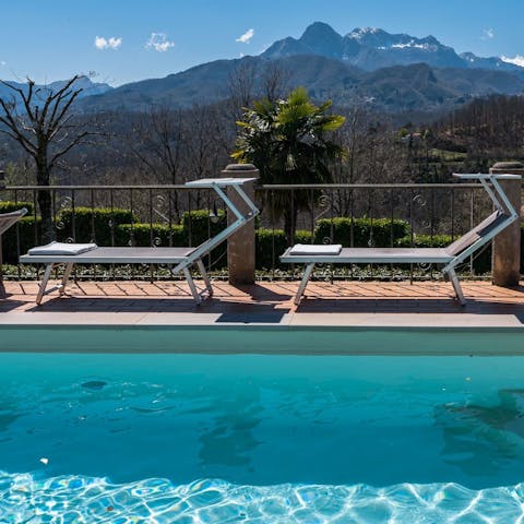 Admire the mountain panoramas from the private pool