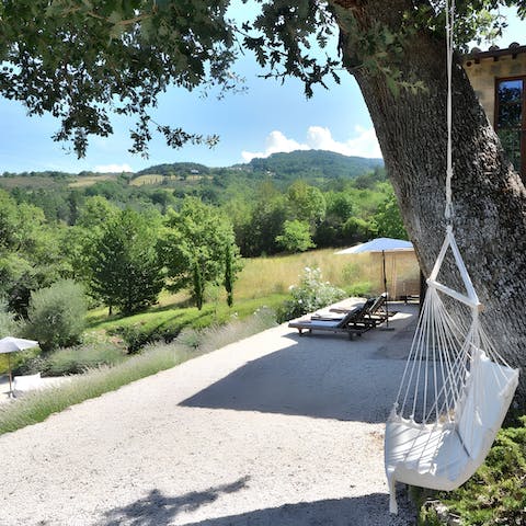 Relax in the hanging chair and get stuck into a good book