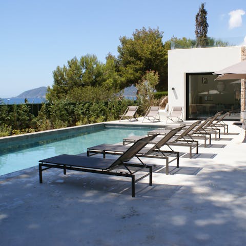 Relax by the pool in the Ibizan sun
