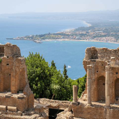 Browse the boutiques and ancient ruins of Taormina, just a short drive away