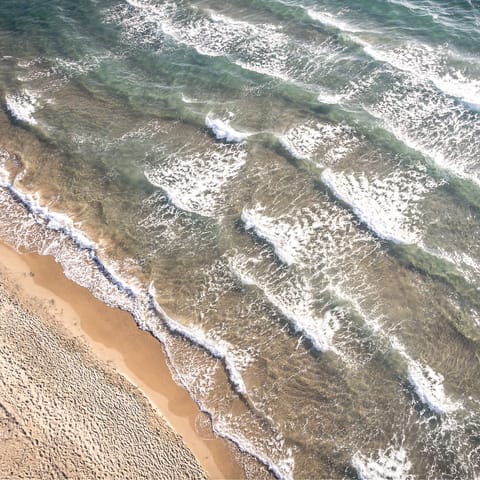 Start your day with a gentle stroll along Paralia Nopigia, a stone's throw from home