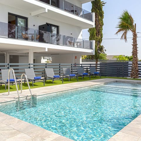 Gof for a dip in the communal swimming pool
