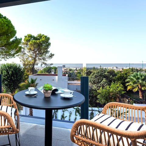 Enjoy your morning coffee on the private balcony