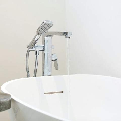 Relax in the luxurious bath after a day of walking