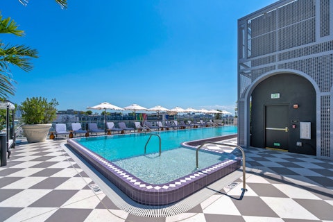 Embrace leisurely afternoons by the rooftop pool