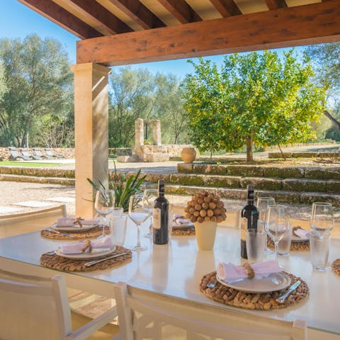 Dine outside in the shade of the covered terrace