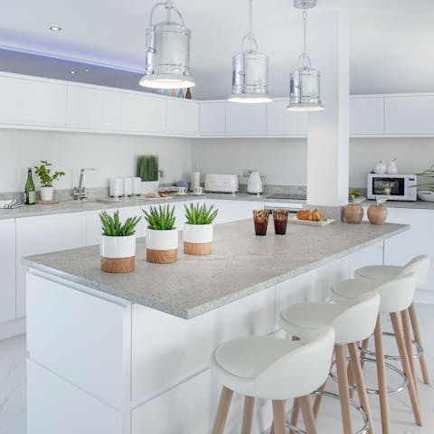 Share delicious meals at the stylish kitchen island