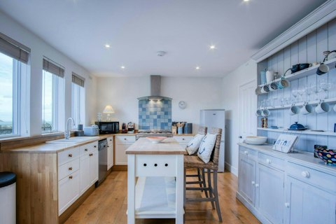 Gather, cook, and relax in one bright, well-connected space