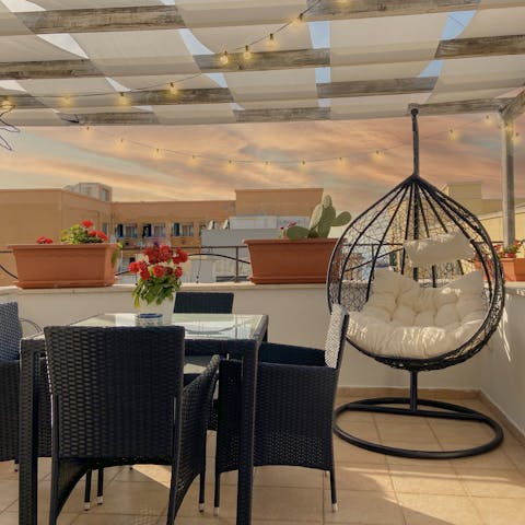 Enjoy sunset vistas from the private rooftop terrace