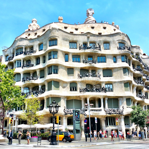 Take the metro twenty minutes to visit the striking Casa Milà