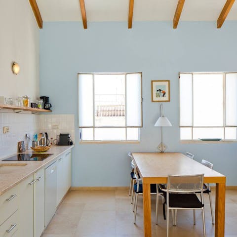 Whip up light bites to share with your loved ones in your pastel-hued kitchen