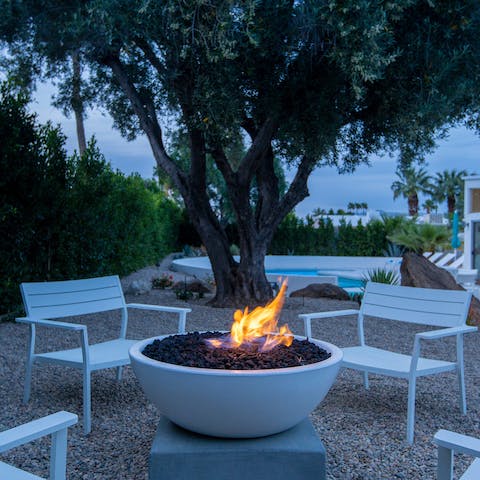 Huddle round the firepit on cooler evenings