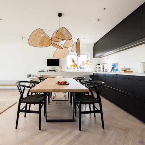 Knock up a lazy brunch in the modern black kitchen