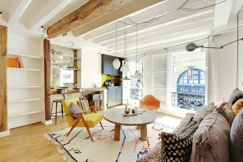 Start your day gazing out over the Parisian street from the sunlit kitchen