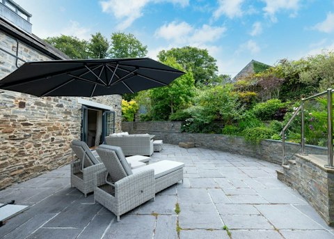 Spend sunny afternoons outside surrounded by lush greenery