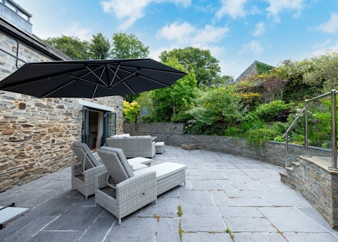 Spend sunny afternoons outside surrounded by lush greenery