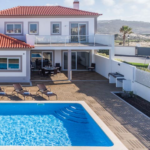 Catch views of the mountains from the poolside
