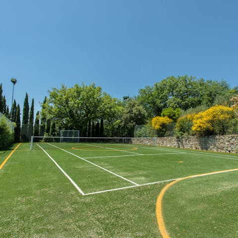 Challenge friends or family to a game of tennis
