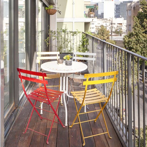 Enjoy a drink on your private balcony after exploring the local markets