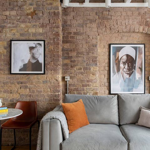 Kick back in the effortlessly stylish living area after a long day of hitting the sights