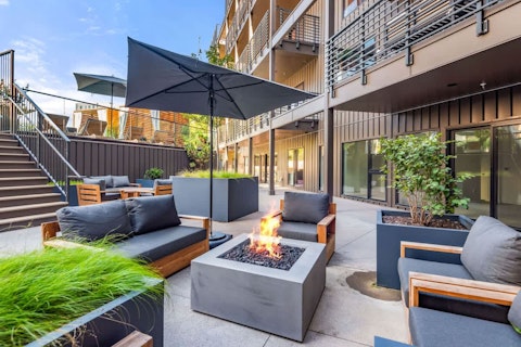 Gather around the shared fire pit on warm Nashville evenings