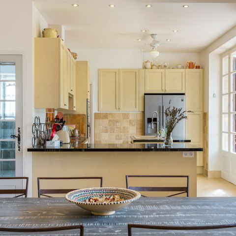 Feast on croissants and coffee in the kitchen