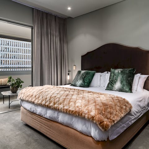 Wake up in comfort in the master suite's plush kingsize bed