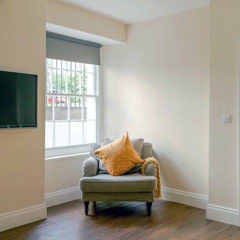 Discover your new favourite reading spot in the armchair by the window
