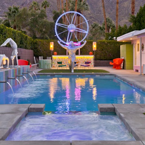 Cool off from the desert heat in the statue-lined pool