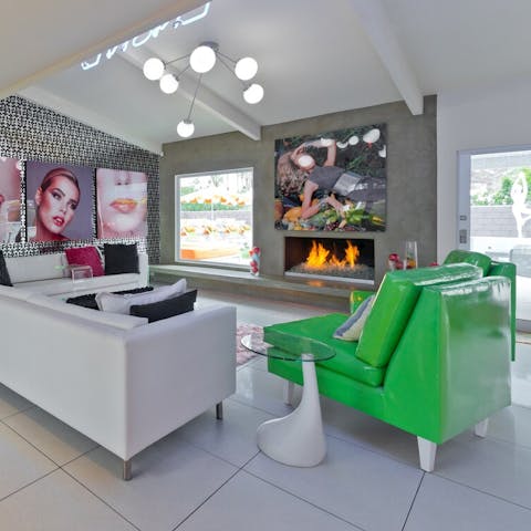 Snuggle up by the feature fireplace in the living area