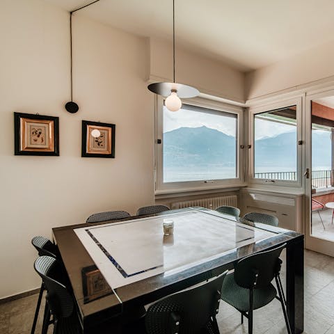 Admire the lake as you tuck into pasta at the dining table