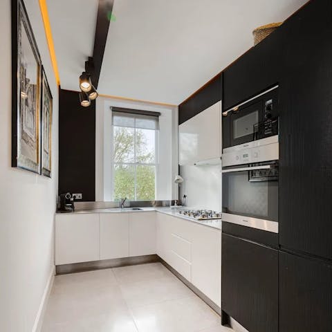 Prepare meals in the monochromatic kitchen