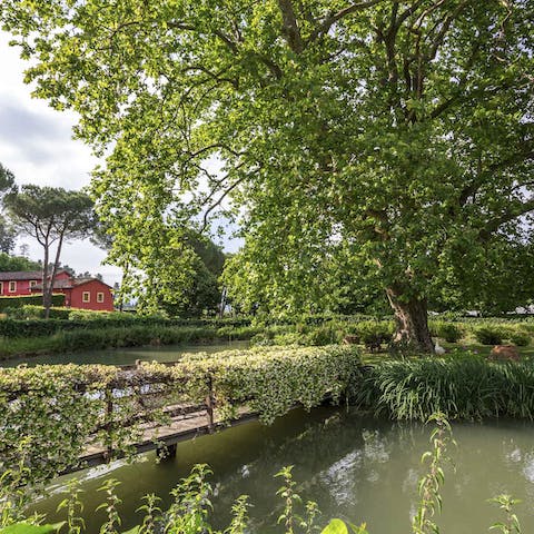 Contemplate life by the villa's private lake