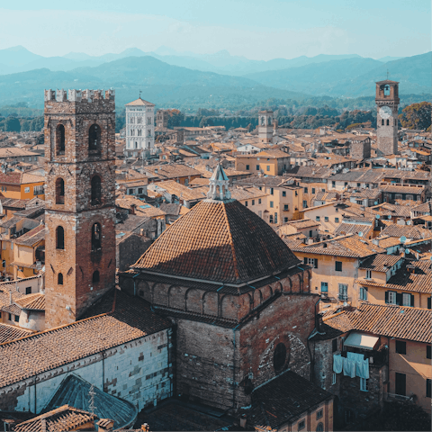 Discover the cobblestone streets and a Renaissance history of Lucca, a ten-minute drive away