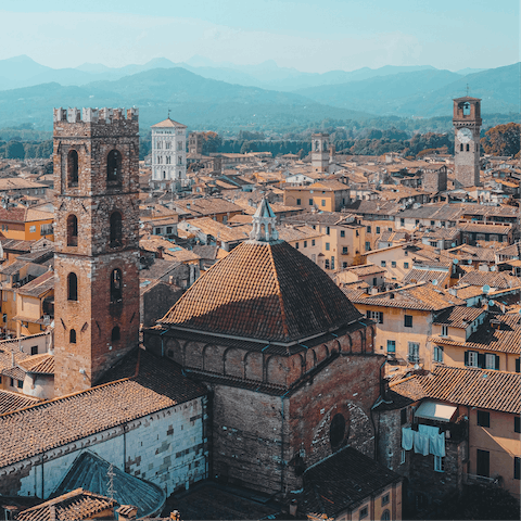 Discover the cobblestone streets and a Renaissance history of Lucca, a ten-minute drive away