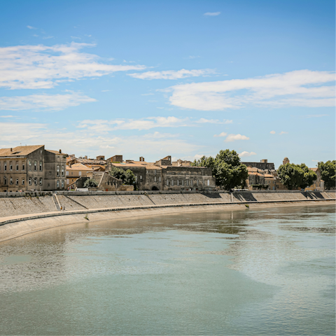 Stroll around the picturesque heart of Arles, a thirty-minute drive away
