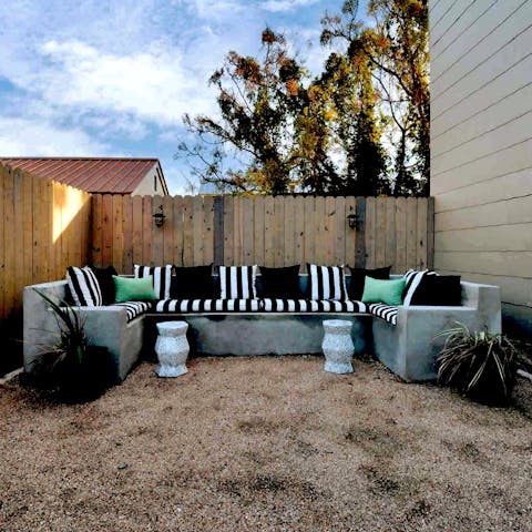 Open a beer and soak up the sun in the courtyard