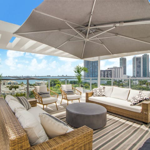Enjoy the view of Biscayne Bay from the private balcony