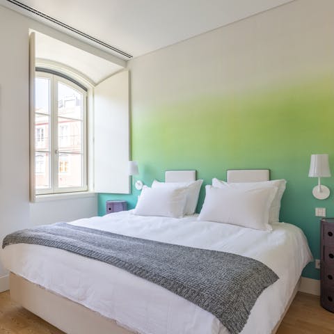 Wake up in the comfortable, colourful bedrooms feeling tested and ready for another day of Lisbon sightseeing