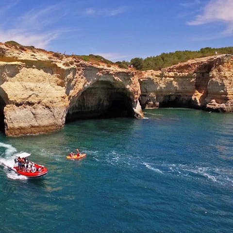 Speak to your host about a boat trip to explore Albufeira's dramatic coastlines