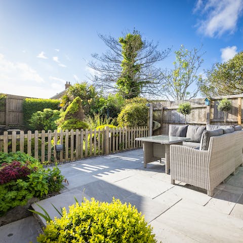 Lounge in the garden oasis while the sun beats down on you