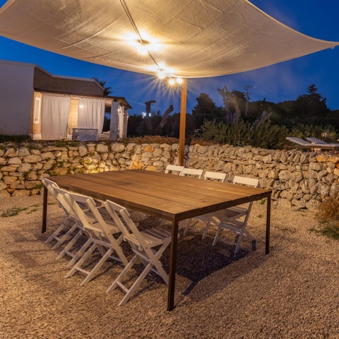 Share stories and alfresco meals at the dining table