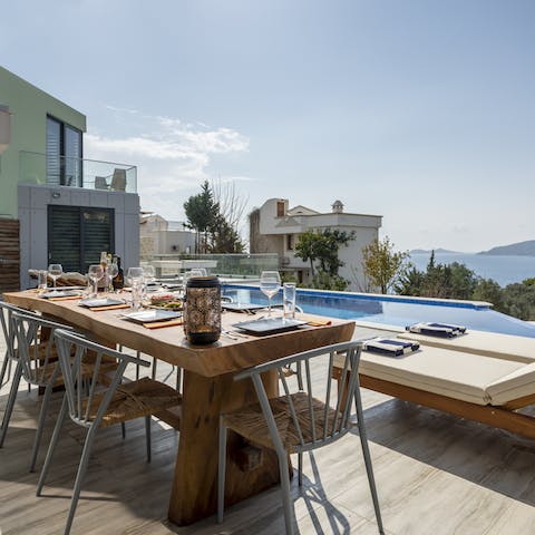 Much on a pool-side alfresco meal