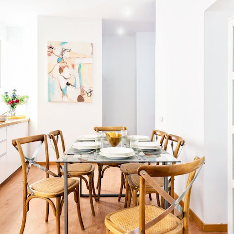 Settle down for dishes of paella and tapas on the dining table