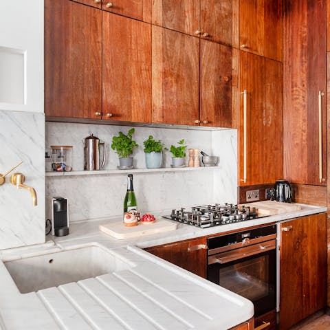 Cook up something special in the bespoke wooden kitchen