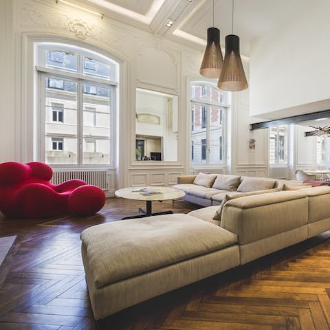 Surround yourself with arty pieces and conversation-starting furniture