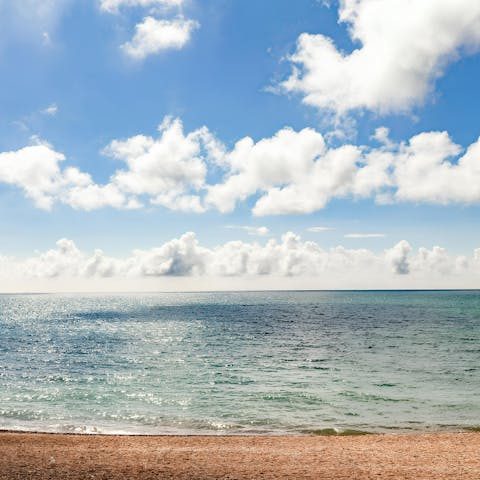 Enjoy ice cream on the beach right in front of this home