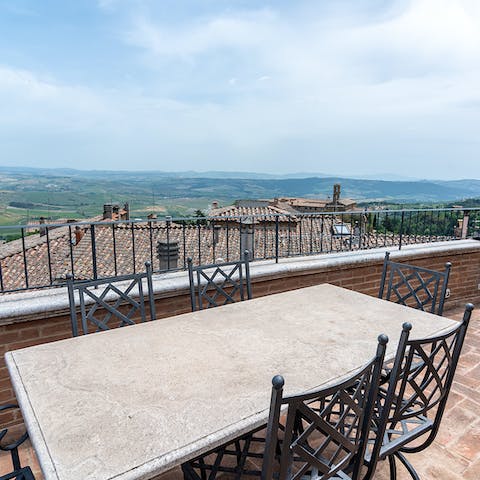 Enjoy a feast cooked on the barbecue on the alfresco table on the roof terrace